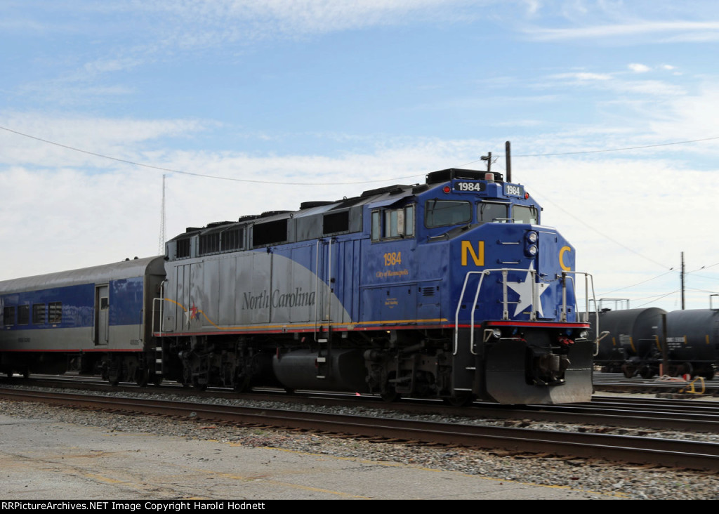 RNCX 1984 leads train 75 at Pomona yard